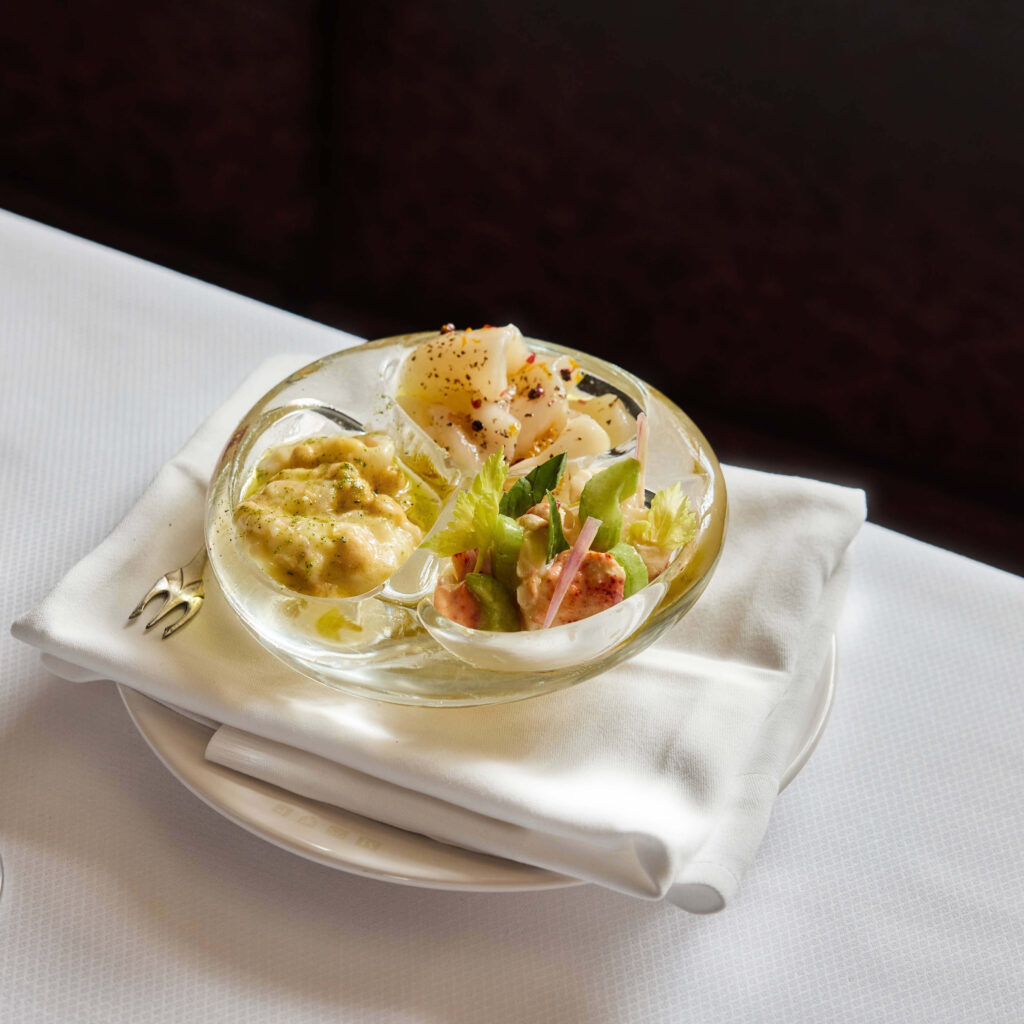 Crudio Trio - Glass bowl with 3 different types of seafood crudo.